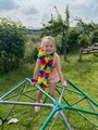 Child playing on frame